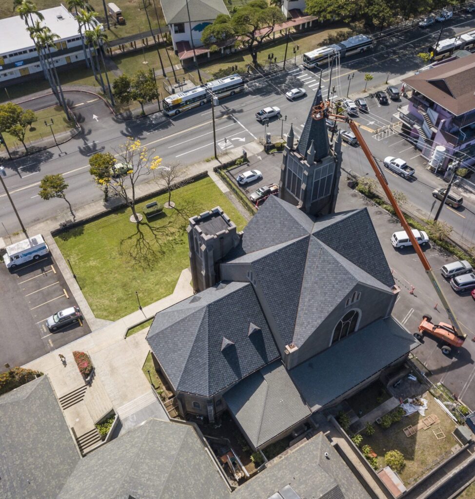 Roofing work on the tall building